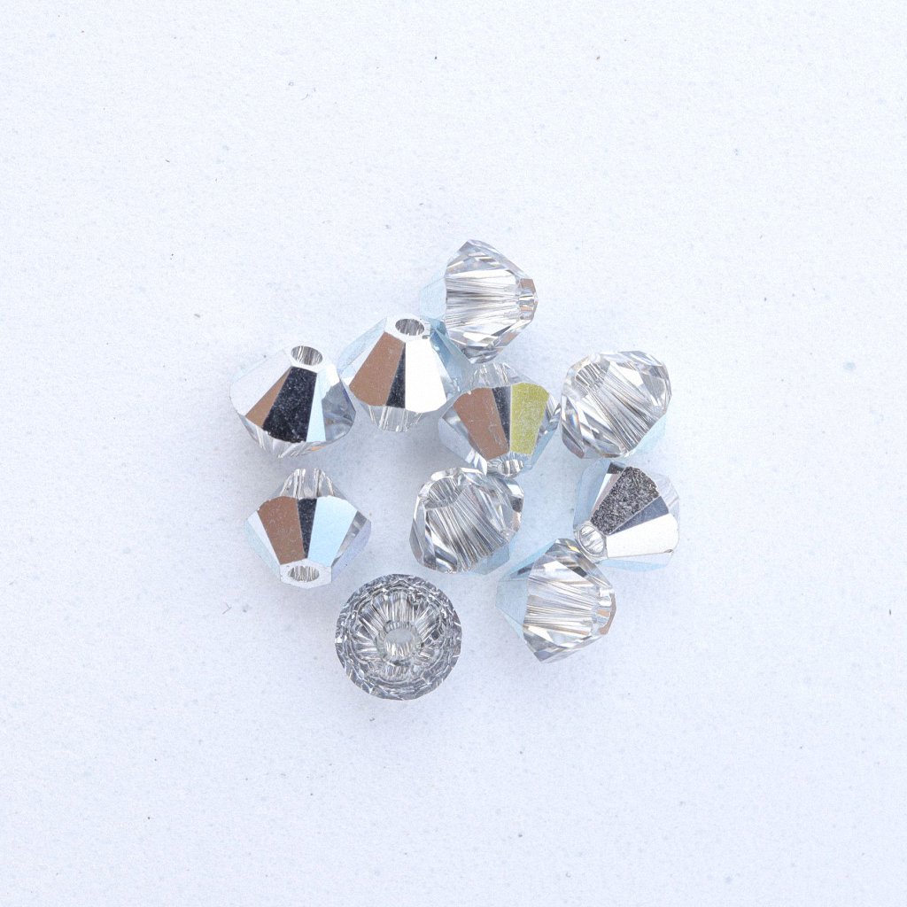 SW_00016 Swarovski® Perle Doppelkegel Bicon 5328 Xilion Beads 4mm crystal comet argent light