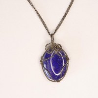 4529 Sehr schöner Lapislazuli-Cabochon (2,5 cm) in Sterlingsilberdraht gewired