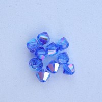 SW_00023 Swarovski® Perle Doppelkegel Bicon 5328 Xilion Beads 4mm sapphire AB